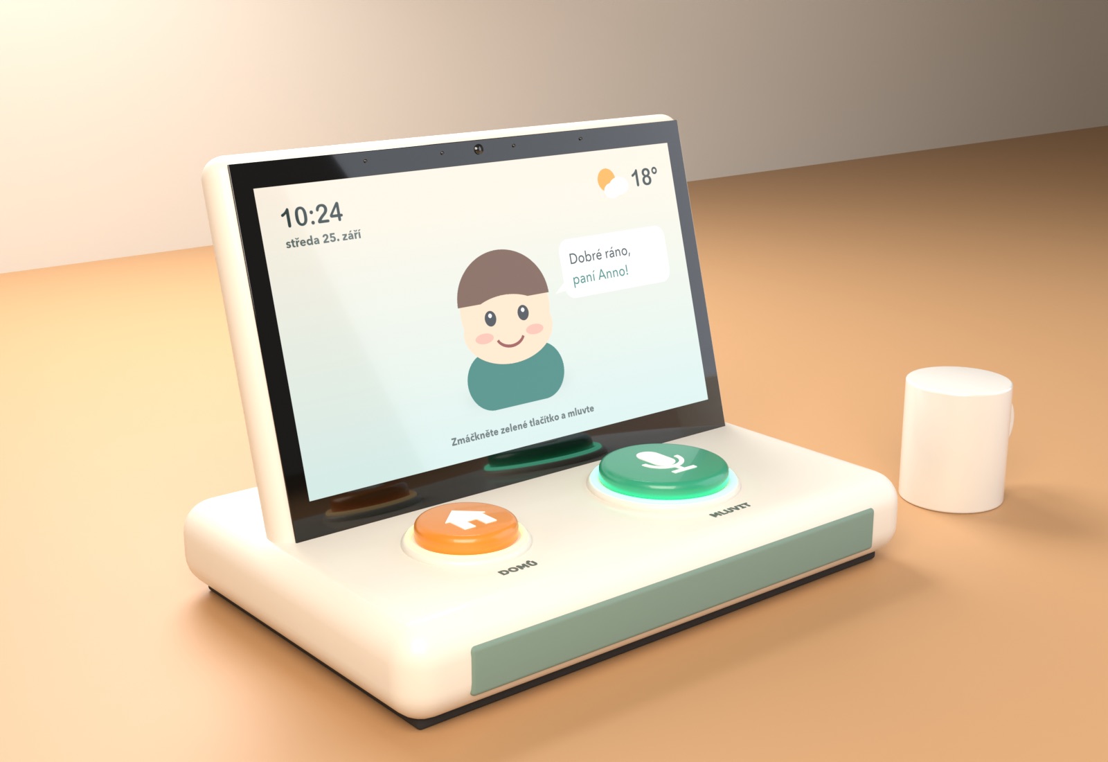 Three-quarter render of the terminal: warm-white weighted base with a sage speaker strip, a 15.6 inch screen leaning back showing a friendly avatar, a large green microphone button and a smaller amber home button, with a coffee mug for scale.